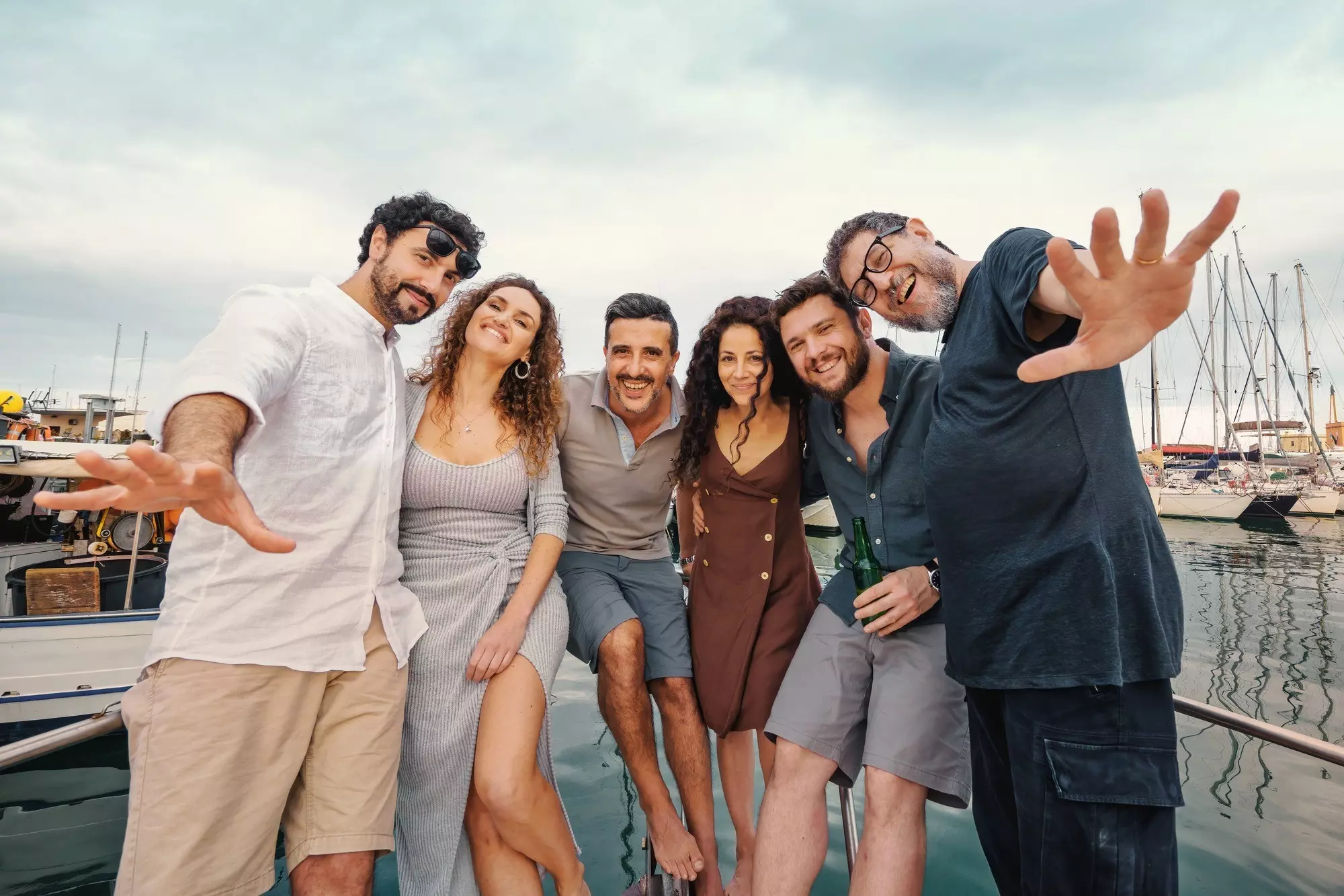 Joyful Friends Gathering on Yacht - Group Celebration